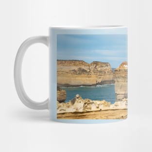 Limestone rocky outcrops at Loch Ard Gorge, Australia. Mug